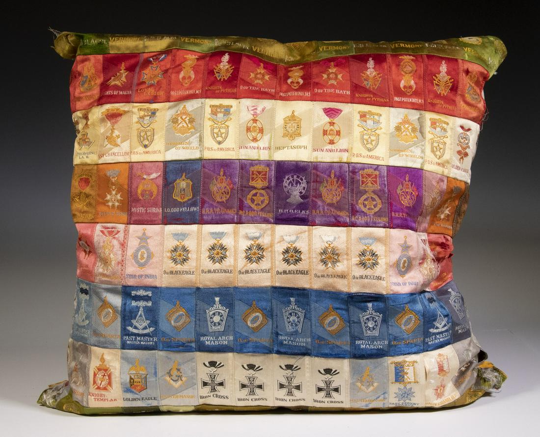 CIRCA 1910 PILLOW MADE OF CIGARETTE SILKS: 20" square overstuffed pillow made up entirely of about (200) cigarette silk premium, themed with Fraternal subjects and organization, Schools and State Seals. Generally very good condition, a few ind