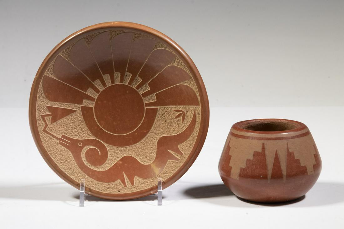 (2 PCS) SOUTHWESTERN REDWARE, THE DISH BY ADELPHIA: Small dish featuring thunderbird feathers and a serpent, signed by Adelphia, 6" diam.; PLUS a small bowl with split steppe design, 2 1/2" x 3 1/2". Good condition.