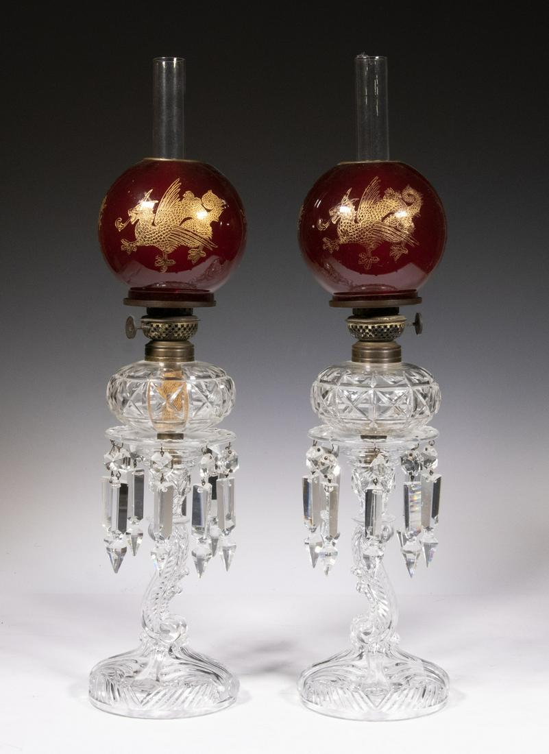 PR VICTORIAN GLASS LAMPS: Pair of 19th c. Fancy Glass Kerosene Lamps, in four sections, each including a pattern glass candlestick base with collar suspending eight drop crystal pendants, a cut crystal whale oil peg lamp inser