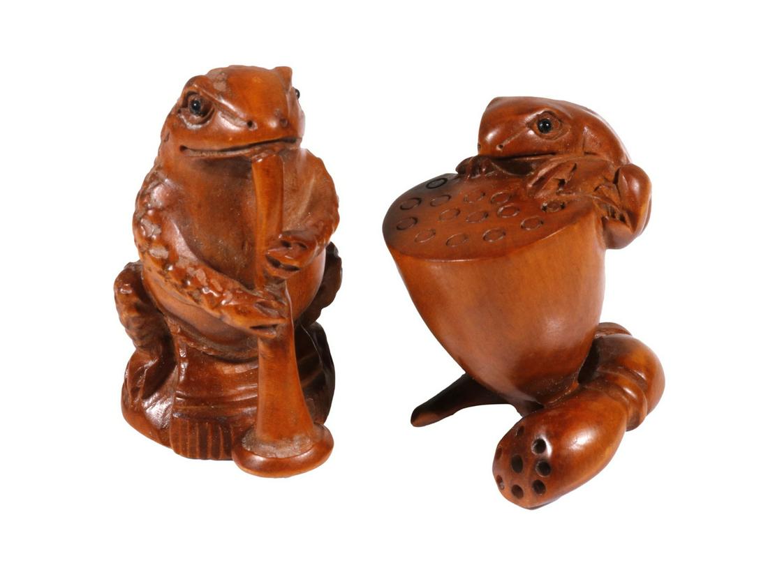 (2) JAPANESE HARDWOOD NETSUKE, SIGNED: Toad Horn Player and Frog Drummer, both signed on the underside by the same artist, 2" & 1 3/4" tall, good condition.