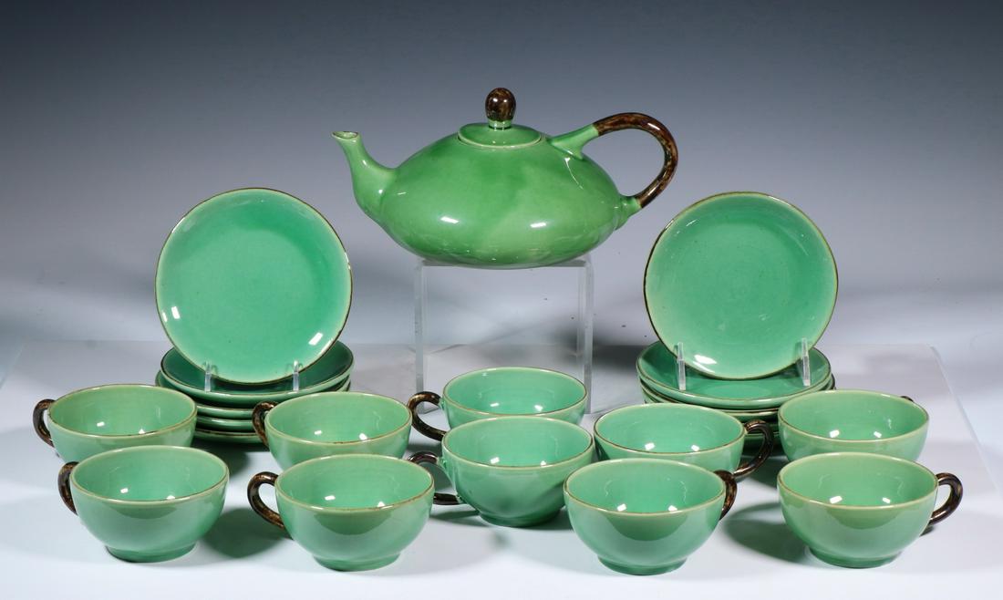 (21 PC) FRENCH POTTERY TEA SET: (21) Piece Terre e Provence Green Glazed Earthenware Tea Service, incl: Teapot, 5" high, 10 1/2" wide; (10) Cups, 2 1/4" high; and (10) Saucers, 5 7/8" diam. Good condition.