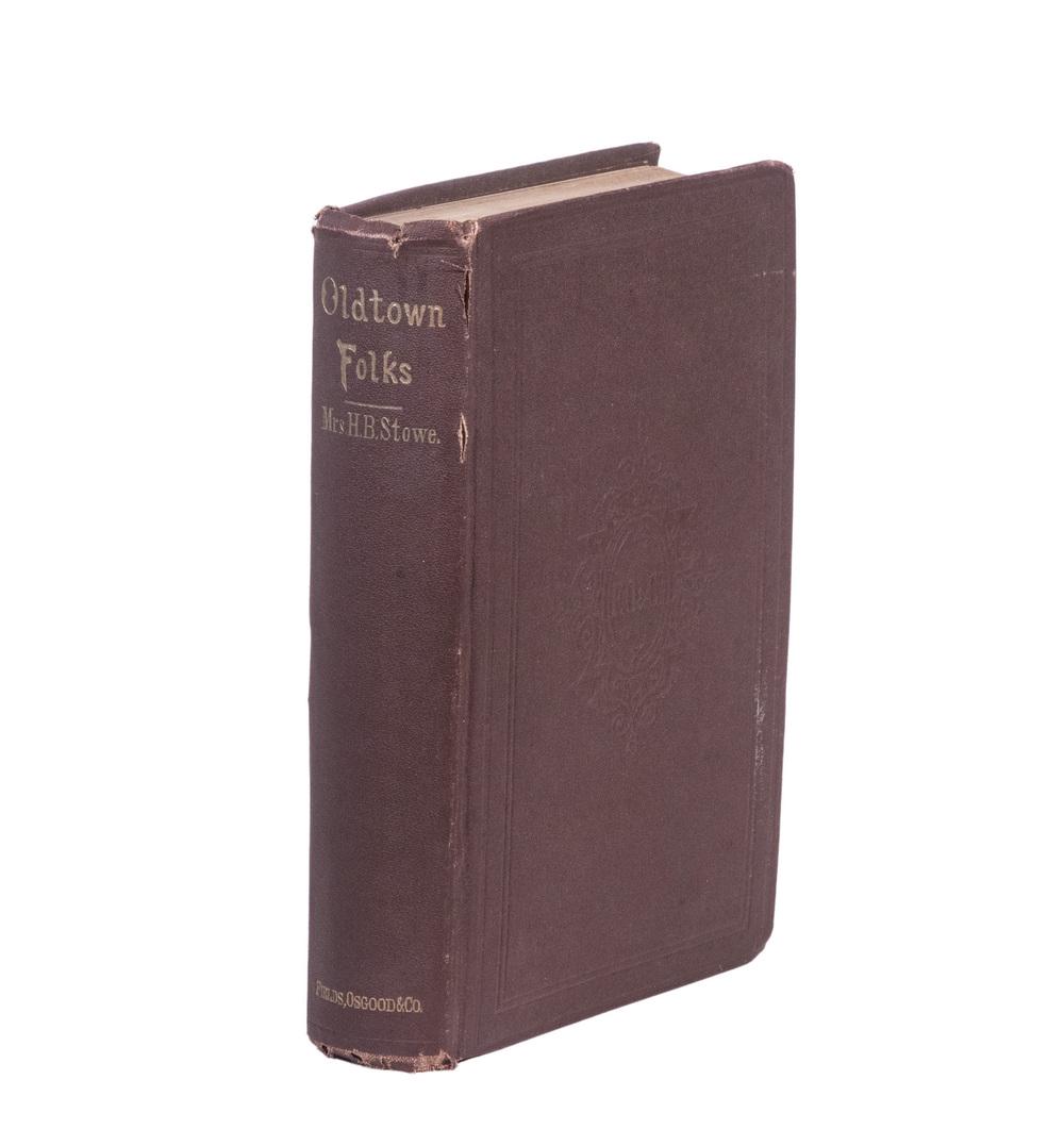 SCARCE STOWE TITLE: "Oldtown Folks" by Harriet Beecher Stowe, Boston; Fields, Osgood & Co., 1869, brown blind stamped binding, gilt tile, brown endpapers, first edition with notes on points in pencil inside back free end