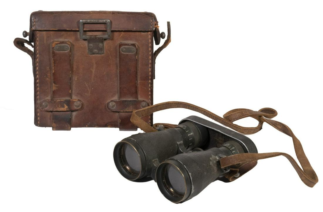 LEATHER CASED PR OF WWI GERMAN FIELD GLASSES: Pair of Emil Busch Rathenow Fernglas 08 Binoculars, SN 89190, with leather case, leather strap, 5 3/4" high, 6" x 2 3/4". Surface wear, leather scratches and cracking.