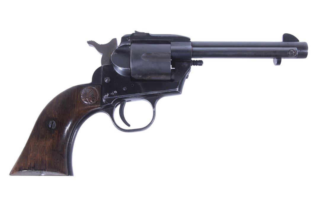 SAVAGE MDL. 101-22 SINGLE-SHOT PISTOL, .22 LR: Manufactured by the Savage Arms Company, this piece is intended as a boy's target pistol manufactured to look like a Colt Peacemaker. The pistol features an all-black finish to the metal and wood grip