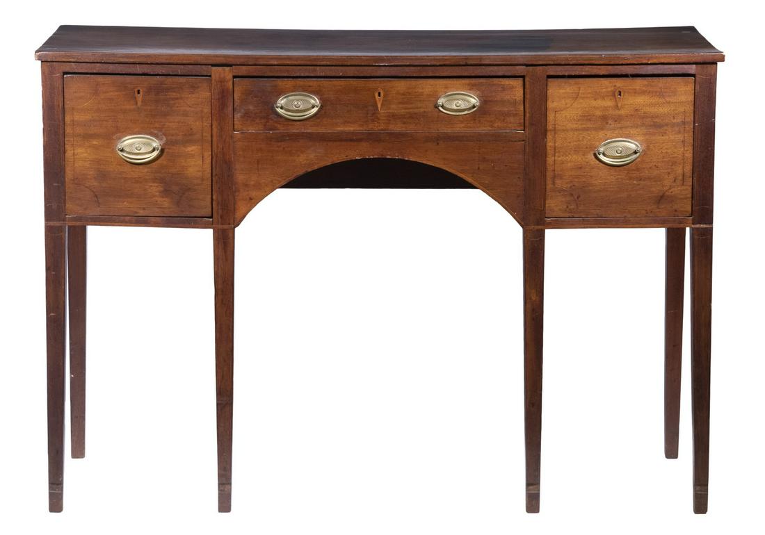 HEPPLEWHITE SIDEBOARD: Late 18th c. Inlaid Mahogany Sideboard, with single plank top, string inlaid front with central flatware drawer flanked by bottle drawers, oval repousse brass drop bail pulls (not original), diamond i