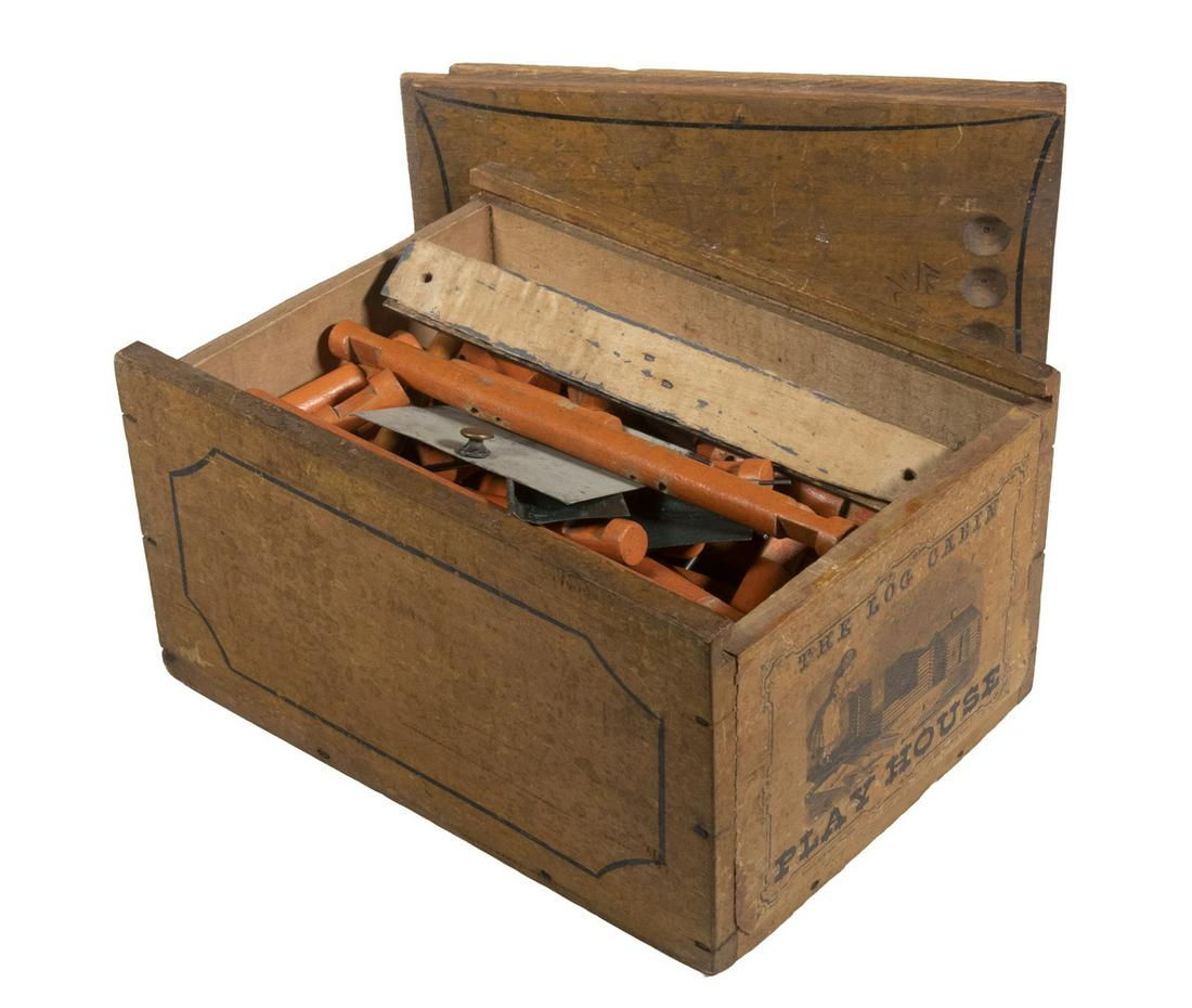 CIVIL WAR ERA TOY: THE LOG CABIN PLAY HOUSE: Rare 1860s Boxed Building Toy by Ellis, Britton & Eaton (Springfield, VT), complete with wood and metal parts to build a miniature log cabin (possibly created as a tribute to President Lincoln who was