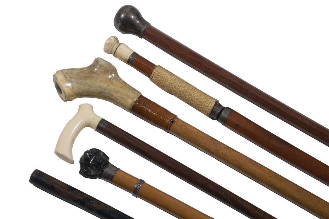 (6) 19TH C. WALKING STICKS (2 WITH SWORDS): Including: Tapered mahogany octagonal stick with stamped gradients 'No. 1' etc; and a weighted silver head engraved "D.C. Horner, R.R. Wrecks" having the number 66 in a crescent moon with number 14 be
