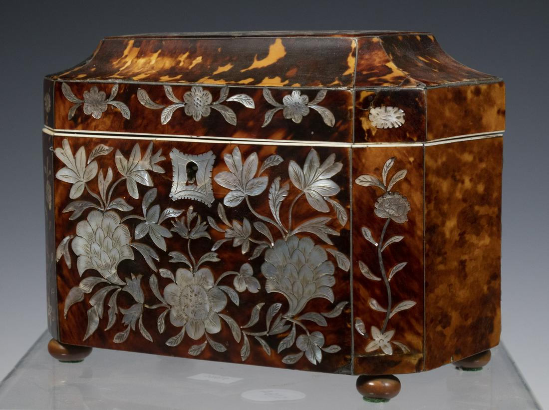 MOTHER-OF-PEARL INLAID TORTOISESHELL TEA CADDY: English Regency Period Stepped Lid Tea Caddy, with canted corners, exuberant floral design mother-of-pearl marquetry inlaid lid and front panels, set on wooden bun form feet, velvet lined lid, two int