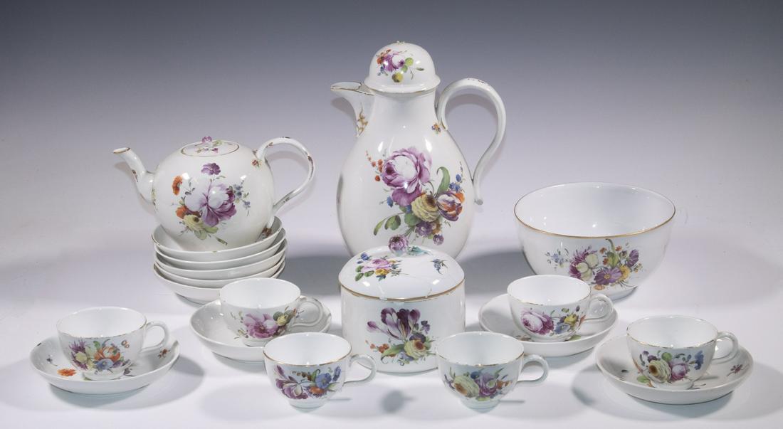 THE HAGUE DECORATED ANSBACH PORCELAIN TEA & COFFEE SET: Late 18th c. (19) Piece Partial Beverage Set, in Ansbach (German) porcelain decorated in The Hague (Holland), with hand painted floral decoration and gilded rims, overglaze blue stork marks, incl: Cof