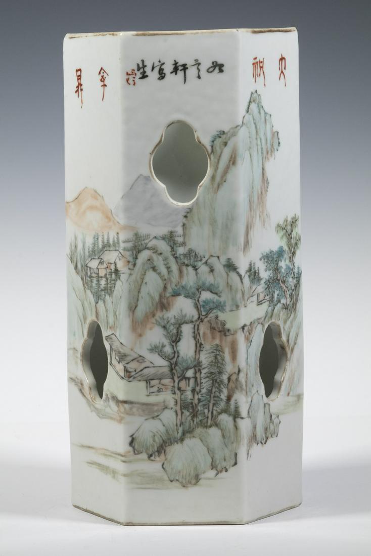 CHINESE HEXAGONAL HAT STAND: Late 19th - Early 20th c. Famille Rose Porcelain Stand, with mountainous landscape decoration, overglaze painted Chinese calligraphy at top and on three side panels including seal mark, red painted ma
