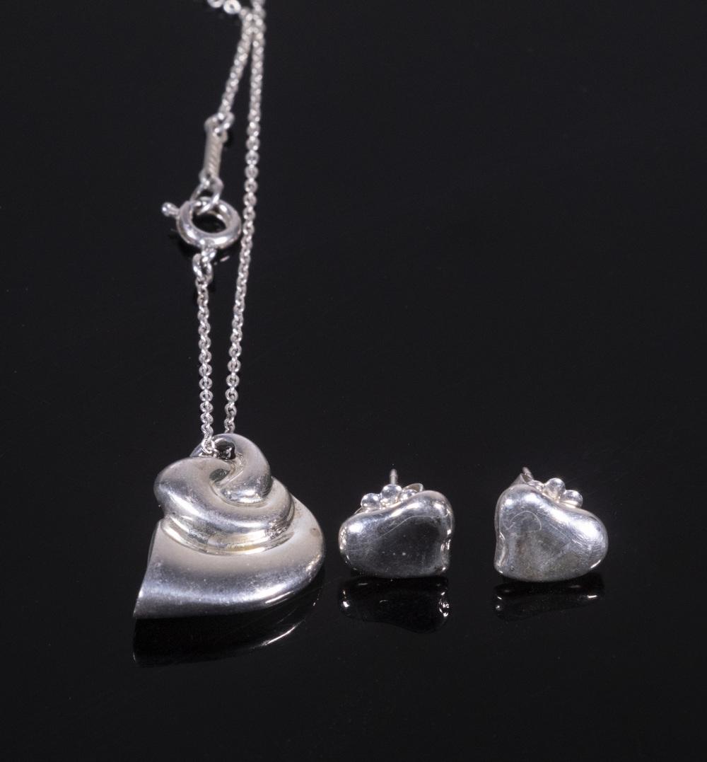 TIFFANY & CO. PERETTI EARRINGS & NECKLACE SET: (2) Pieces of Tiffany & Co. Sterling Silver Jewelry, designed by Elsa Peretti, incl: Pair of pierced earrings, 1/4" x 3/8"; and Chain necklace with shell form pendant, 14 3/4" long, pendant: 5/8" x 1/