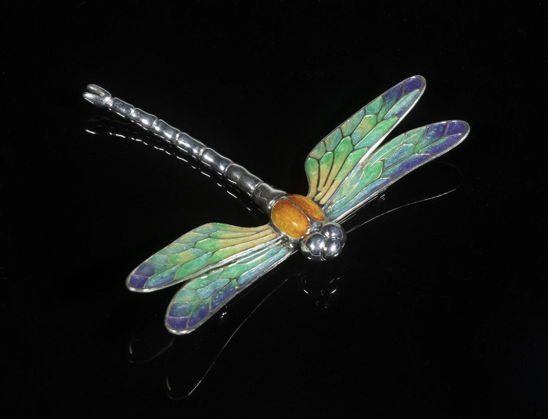 ENAMELED SILVER DRAGONFLY BROOCH: Italian Sterling Silver Pin, in the form of a dragonfly with polychrome enamel decoration, retailed by Scully & Scully, 2 1/2" high, 3" wide, 0.61 ozt. Good condition.