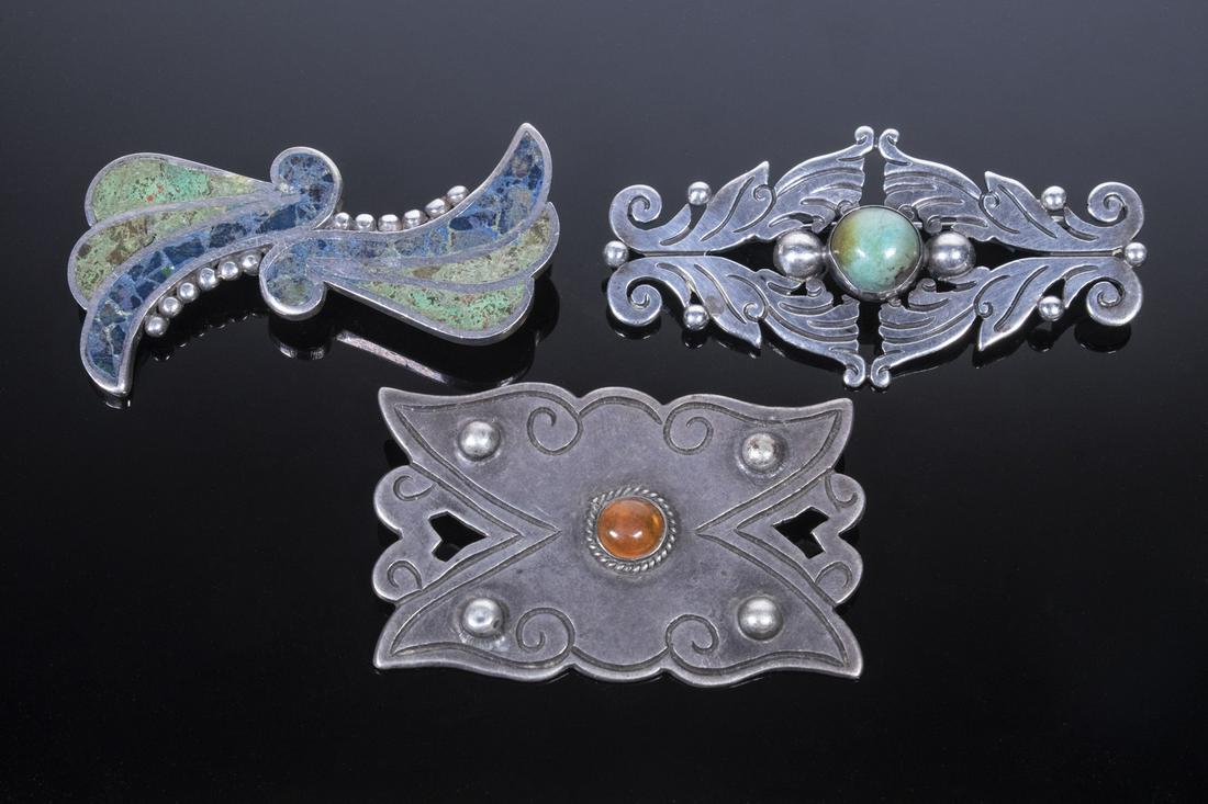 TAXCO STERLING BROOCHES: Lot of (3) Vintage Mexican Silver Pins, with stones, all stamped "Taxco 980", incl: Bow form with inlaid turquoise, beaded edges, 1 1/8" x 2 3/8"; Rectangular openwork brooch, with beads, center set w