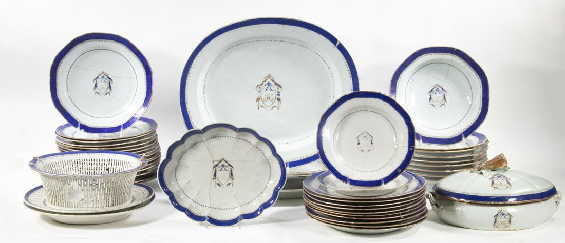 (52 PCS) CHINESE EXPORT ARMORIAL PORCELAIN: (52) Piece Lot of 19th c. Chinese Export Blue and White Porcelain Dishes, with painted crest with drapes, bows and shield centered with H monogram, incl: (10) 9 1/4" diam. plates, five with cracks, mo