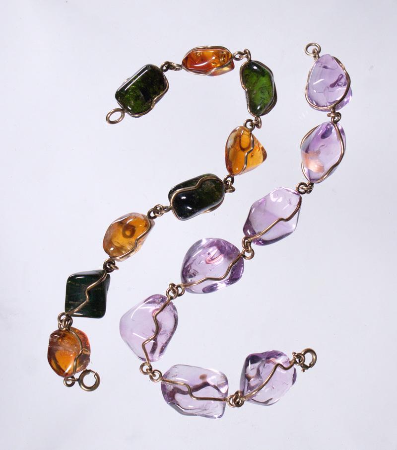 (2) SEMIPRECIOUS STONE TUMBLED NUGGET BRACLETS: Lot of (2) Vintage Link Bracelets of Gold Tone Wire-Wrapped Polished Nuggets, incl: Amethyst nugget bracelet, seven stones, 7 1/2" long, one stone has small occlusion; and Bracelet of alternating citr