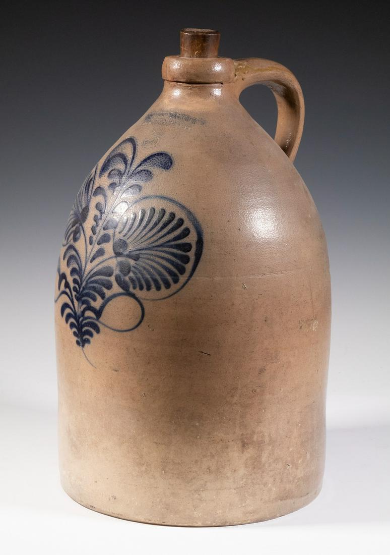 FENTON & HANCOCK, ST. JOHNSBURY, VT STONEWARE JUG: Circa 1860 Three-Gallon Salt Glazed VT Stoneware Jug, by Fenton & Hancock, with cobalt slip-trailed floral and fern decoration, impressed maker's mark and '3', 16" high, 9" diam. Repaired rim break.