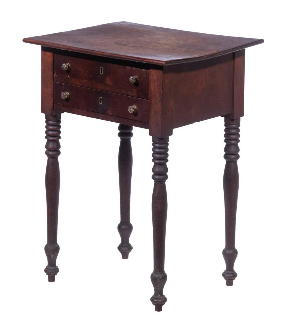 SHERATON STAND: Federal Period Mahogany Side Table, having two drawers with glass pulls, set on turned legs, 27 1/2" high, 20" x 16 1/2". Top stains and surface wear, veneer loss area to edge of one drawer. From the