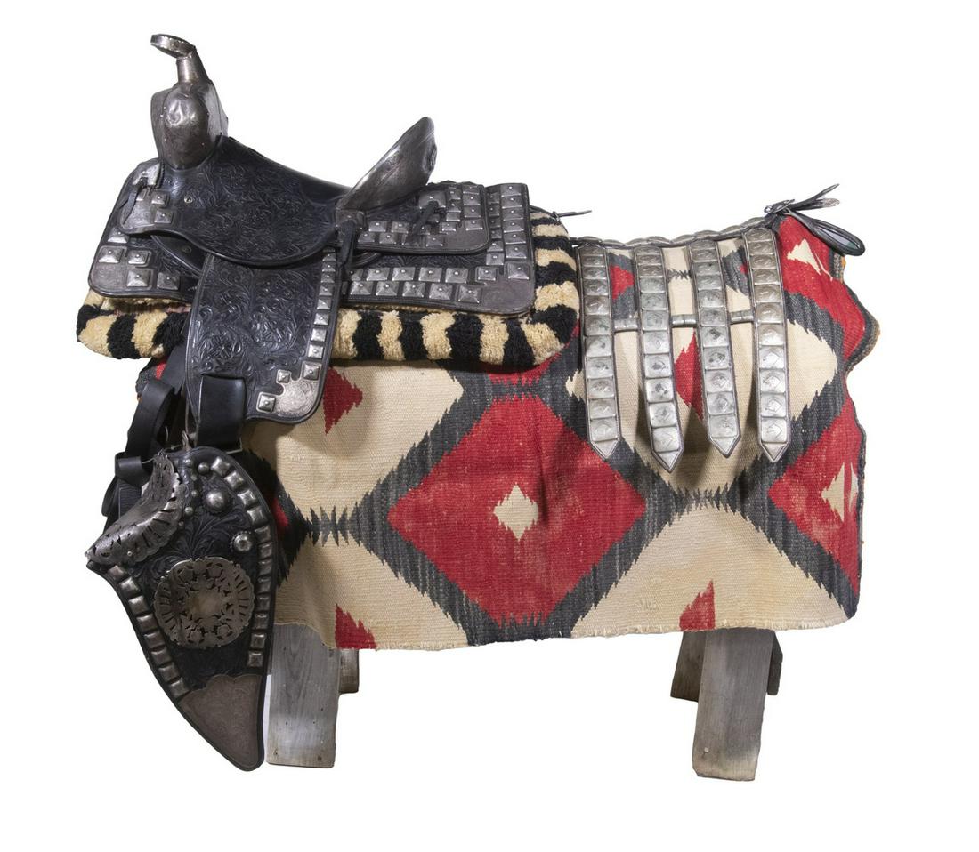 1940S SILVER SADDLE W/ ACCESSORIES BY EDWARD BOHLIN, HOLLYWOOD, CA: With maker's tag and owner's initials "CRS" on the back, (possibly the Western Star Charles Robert Starrett (1902-1986) who made over 165 movies as the "Durango Kid"). Components in tooled black leath