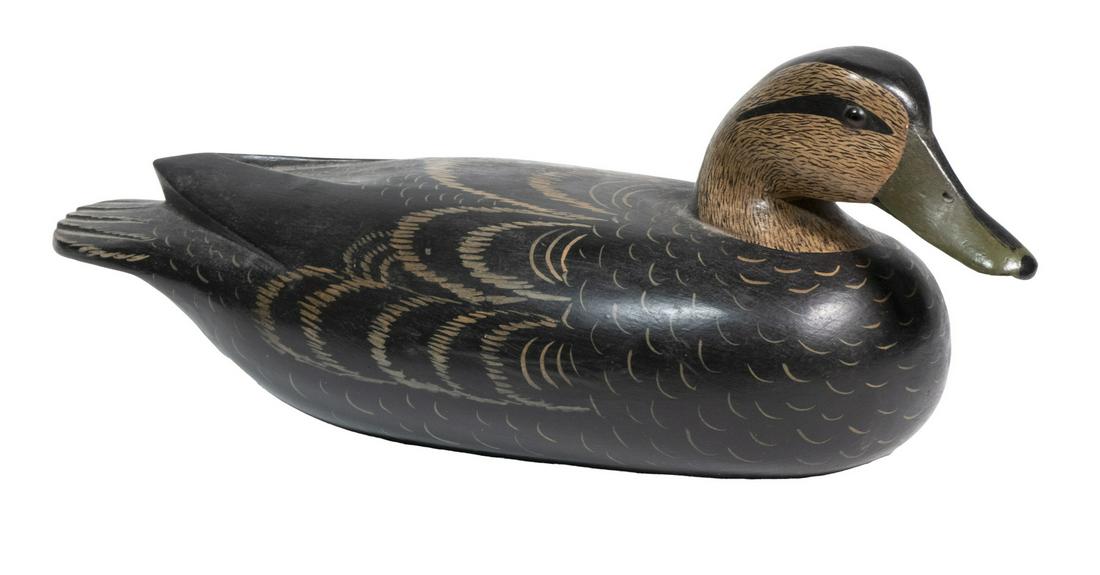 ROBERT "BOB" WHITE (PA, 1939- ) FEMALE MALLARD DECOY: Carved and Painted Hollow Body Duck Decoy, by Robert White (402 Main St., Tullytown, PA), with glass eyes, finely shaped and painted body, with metal maker's plaque attached to base, 6" high, 15 1/2"