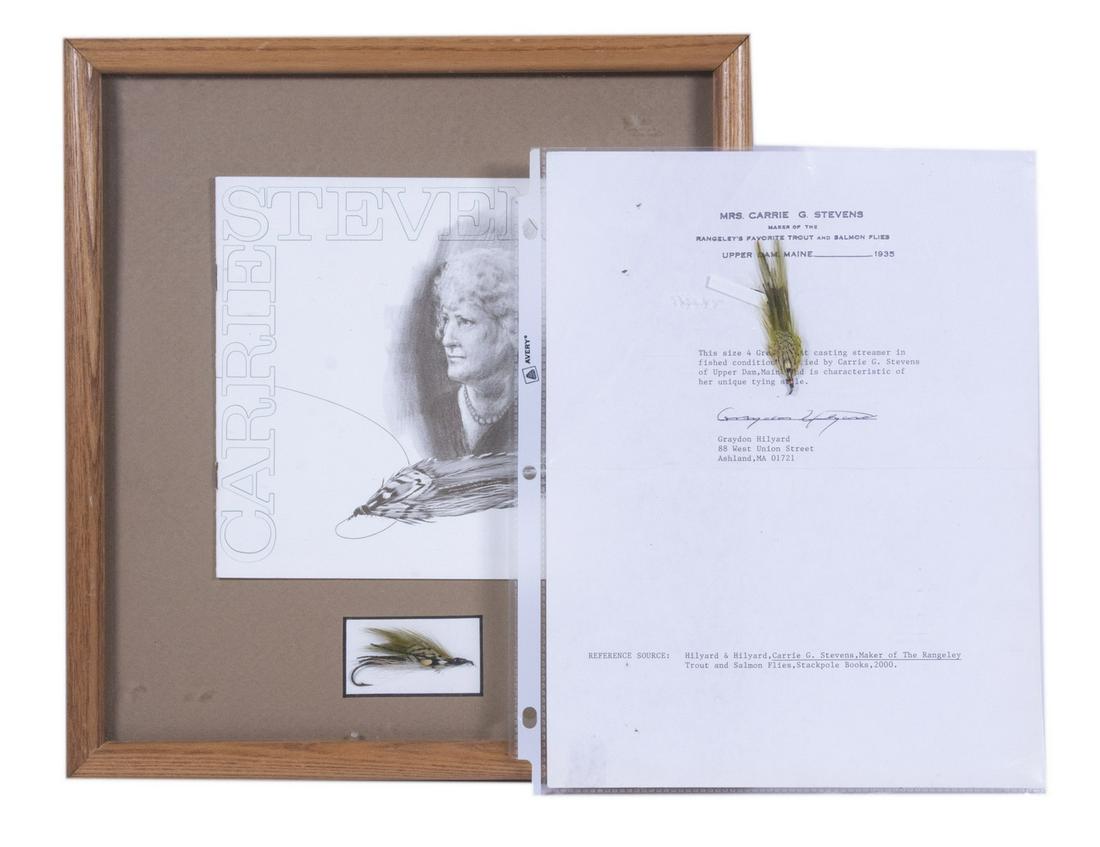 CARRIE STEVENS TIED FISHING FLIES: Lot of (2) Streamers, incl: Oak framed 1970s commemorative brochure about Ms. Stevens (considered one of the parents of New England streamer fly fishing), plus a fly tied by her mounted below, OS: 13"