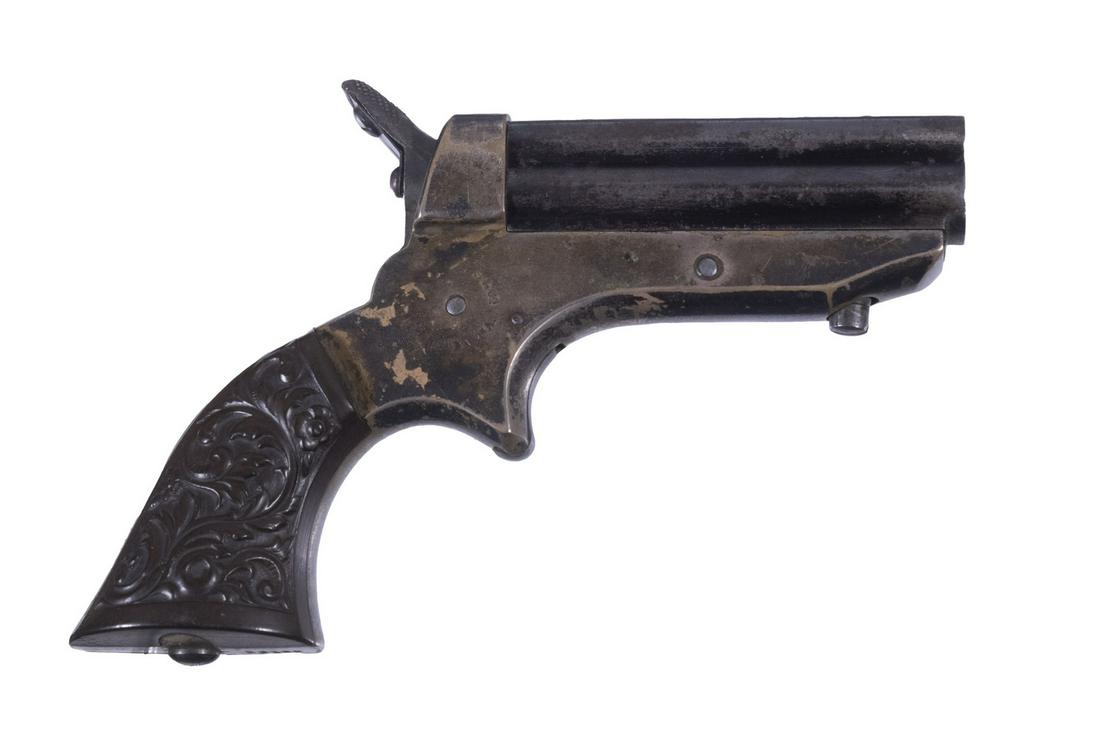 1859 SHARPS PEPPERBOX PISTOL, .22 SHORT: A four-barreled pepperbox designed by Christian Sharps which saw huge popularity in the 19th Century. The firearm features four blue barrels in a box formation with a simple bead front sight mounted i