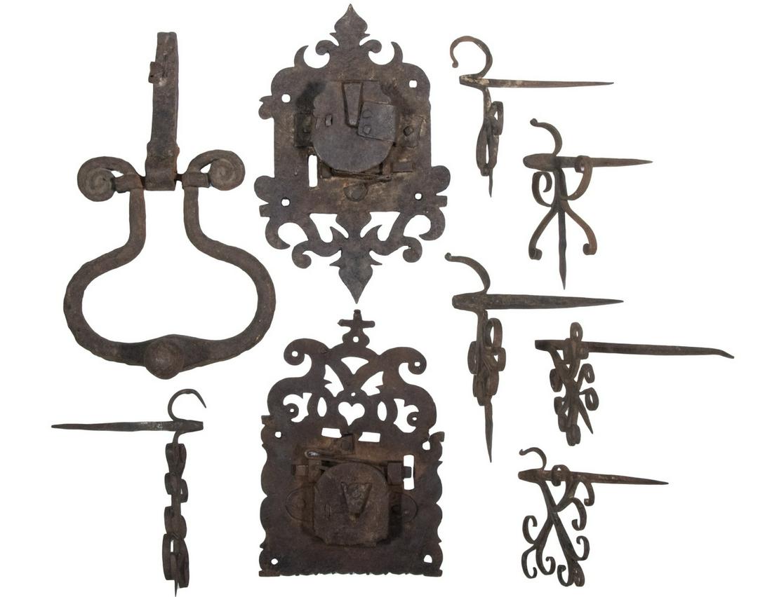 EARLY IRON HARDWARE, INCL. LANTERN HOOK SPIKES: (9) 17th & 18th c. Items, incl: (6) Assorted 18th c. betty lamp lantern hook spikes, 5" to 6 1/2" high; (2) 17th c. locks with door plates, 8 1/4" and 9 1/4" high; and door knocker, 7" high.