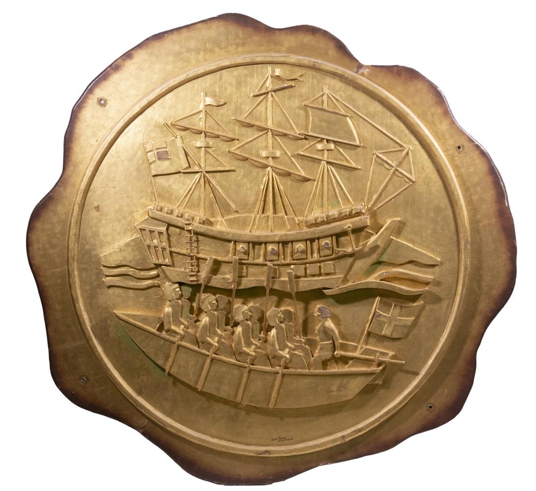 LARGE GILT WOOD SIGN FROM 'DOWN EAST' MAGAZINE OFFICE: Featuring a Galleon with Skiff. 48" round.