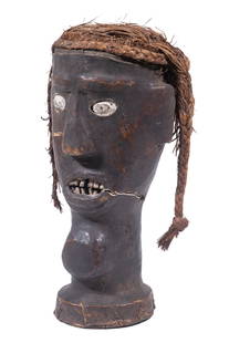 AFRICAN SCULPTURE: Ekoi Head, Ejagham, Cross River Region, Nigeria, goatskin covered wood with raffia hair, 11 1/2" tall, cracks in skin.