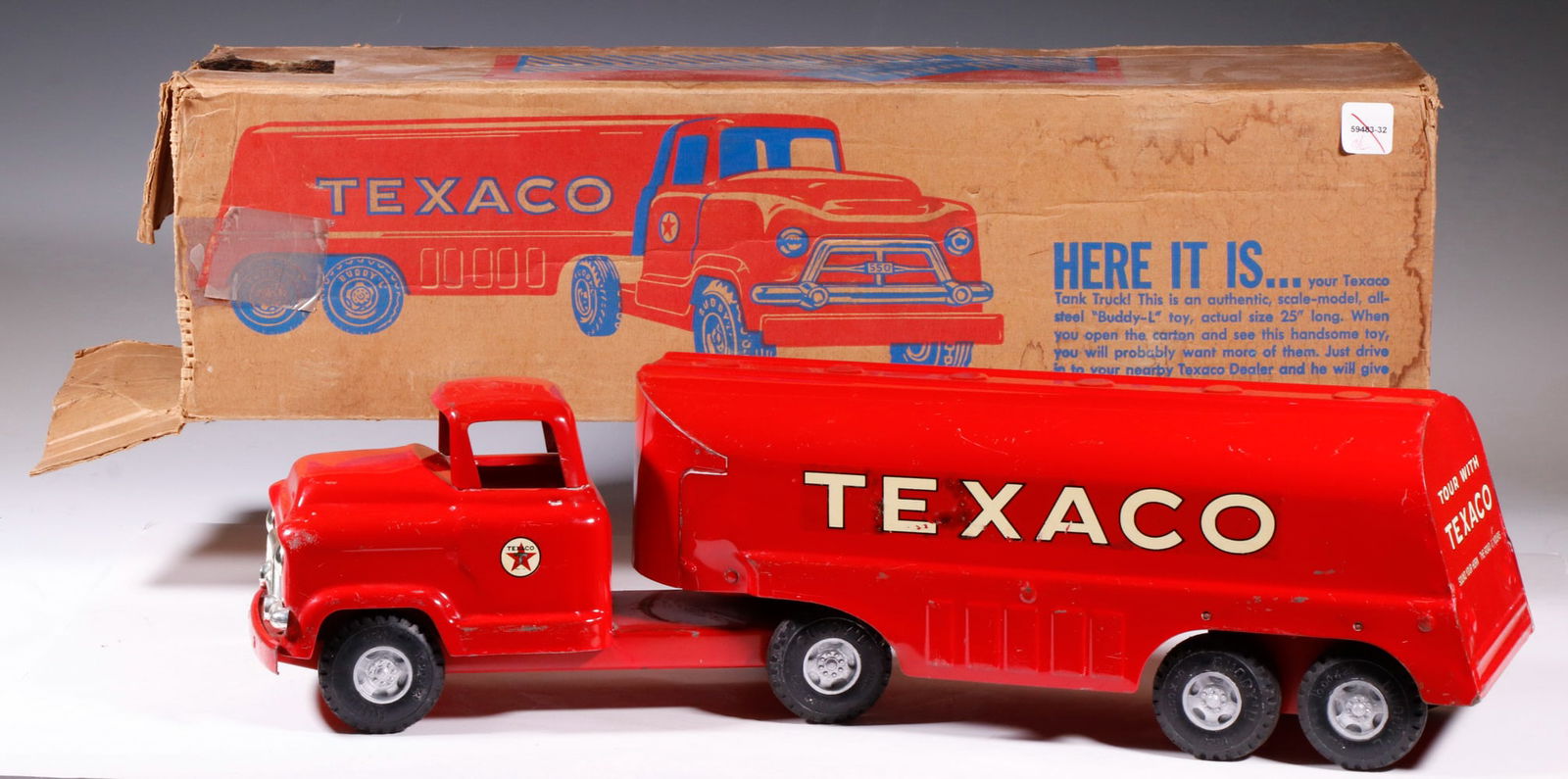 BUDDY L DIECAST TANKER TOY TRUCK: Vintage steel Buddy L Texaco truck; original box postmarked 1959. 6 1/2" high, 24" x 5". All original, minor scuffs to edges.