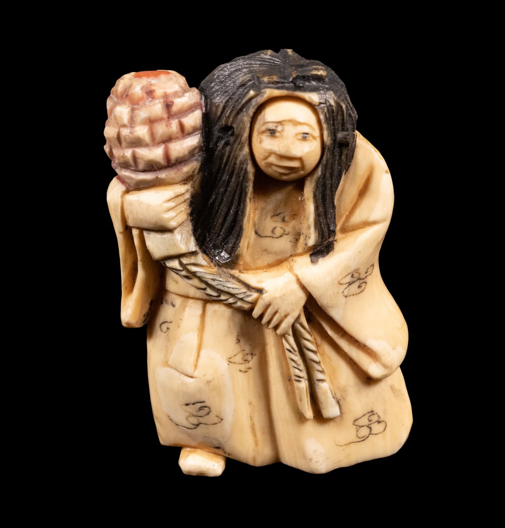 19TH C. JAPANESE IVORY NETSUKE, ARTICULATED, SIGNED: Meiji Period Standing Kabuki Theatre Actor in long shishige wig, having a rolling ball face, changing from happy to angry, a lantern with rope tassels grasped in his left hand, the lantern laid to his