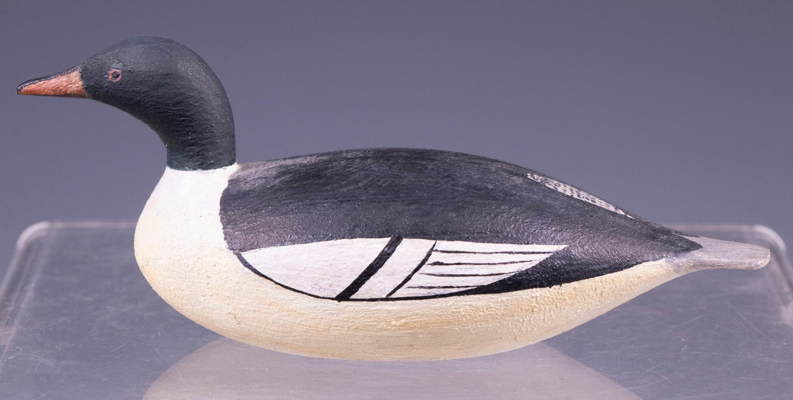 AMERICAN MERGANSER BY JOSEPH LINCOLN: Just a wonderful example of a Lincoln merganser. Clean crisp lines with a delicate wing patch and painted eyes and a slight yellow blending to lower sides. Classic Lincoln and a desirable species. Uns