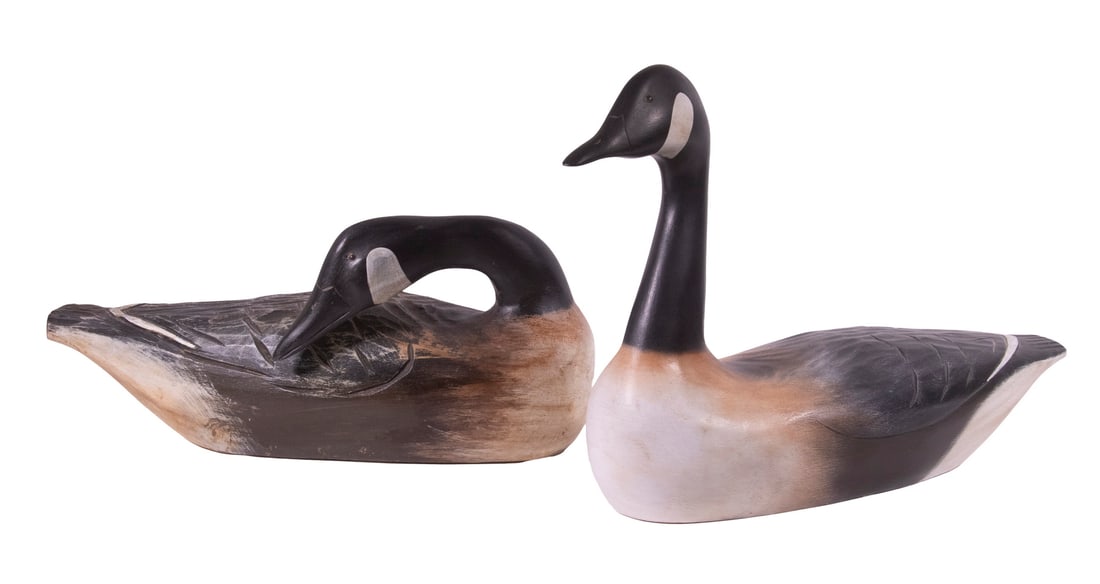 HANK HENRY WALKER (MA, 1919-1995) CANADA GOOSE DECOYS: Group of (2) Carved and Painted Decoys, one preening and one upright, with tack eyes, both signed on base plaques, 15" high, 23" long and 9" high, 20" long.