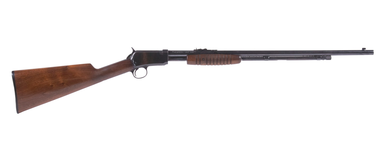 WINCHESTER MDL. 62 PUMP-ACTION RIFLE, .22 LR: A fine varmint rifle made by Winchester in the mid-1930s. The firearm features a round barrel fitted with a bead front post with a simple, elevation adjustable, U-notch rear sight. It is mounted in sm