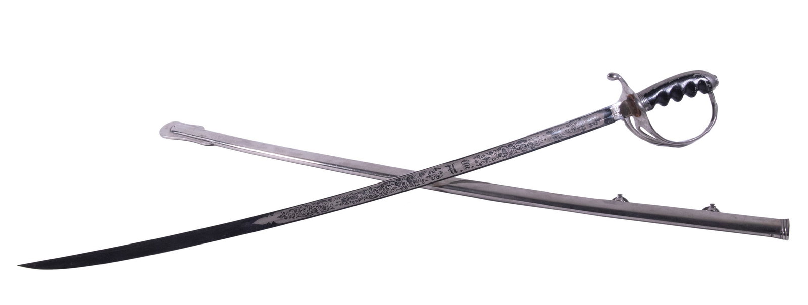 INTERWAR US ARMY DRESS SWORD: Made by the M.C. Lilley Co of Columbus OH, having an etched bright blade, nickle plated scabbard, black grip, US Army dress, ca. 1930-1940. 31" blade, 36 1/2" long overall. Includes vintage cloth slee