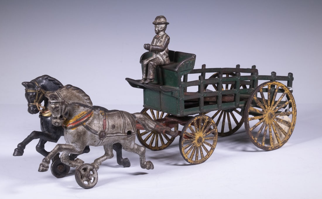 CAST IRON STAKE WAGON TOY (1 of 2)
