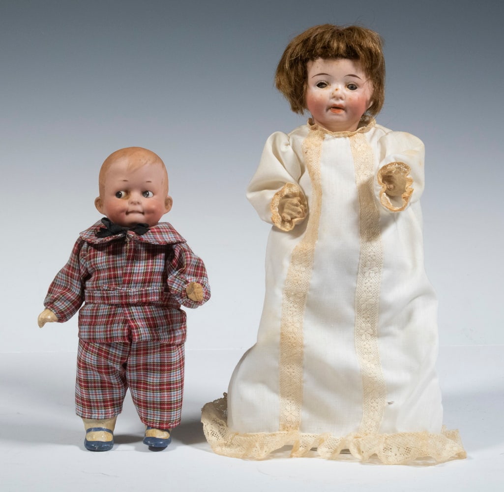 BISQUE HEAD BOY AND GIRL DOLLS: Lot of (2) Small Vintage German Dolls, both with bisque head and composition body, incl: German girl doll, probably by Theodor Recknagel, marked 9/0, having a painted face, open mouth with teeth, stat