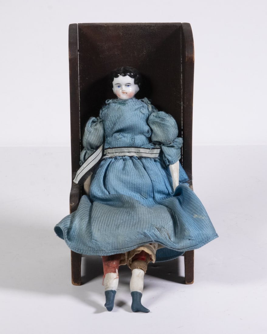 CHINA HEAD DOLL IN WOODEN CHAIR (1 of 2)