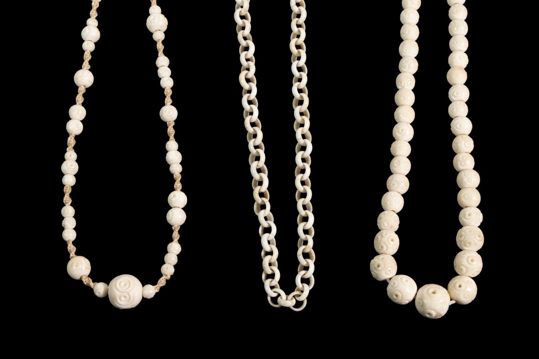 (3) VINTAGE NECKLACES: Including: (2) Asian carved bone bead necklaces, each: 34" long; and (1) Celluloid rope link necklace, 31" long.