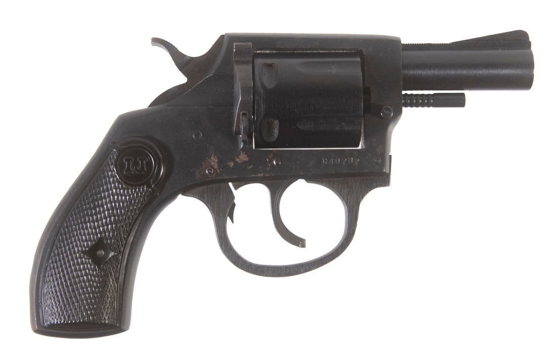 IVER JOHNSON SNUB-NOSE REVOLVER, .38 SPL: A snub-nose DA/SA revolver by the Iver Johnson Company. The gun features an all-black matte finish with black plastic grip panels and a case-hardened hammer. The sights are a simple front blade and tr