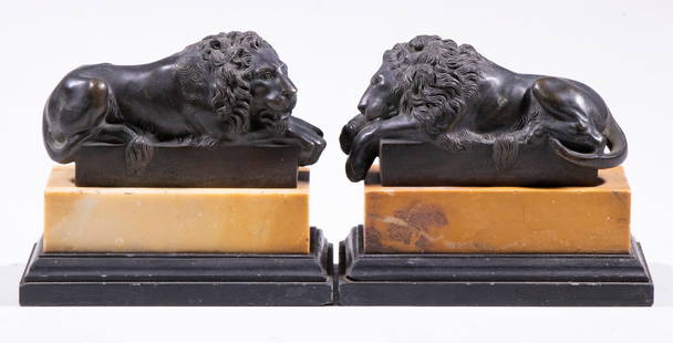 PR OF GRAND TOUR MINIATURE SCULPTURES: Bronze Recumbent Lions on pink marble plinths, to which they pin, they are not attached. From the Florentine style, plaster cast and patinated bronze, in opposing stances, 4 1/2" x 5 1/4" x 3 1/4" eac