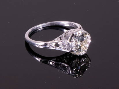 EDWARDIAN PERIOD PLATINUM DIAMOND RING: Centrally set transitional cut 1.85ct (by calculation) Diamond. Clarity SI-1, Color M-N. (8) Single cut and Old Mine cut Diamond accents in setting and under gallery. Good condition. Size 6. 2.27dwt.