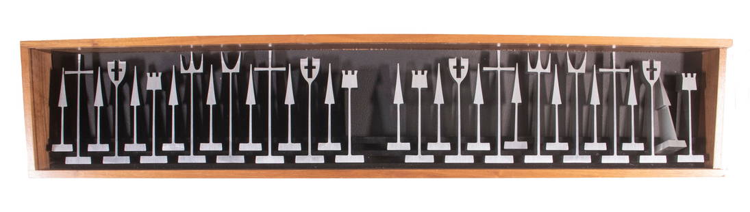 CASED MID-CENTURY MODERN ALUMINUM CHESS SET: 1960s Era American Made Extruded Aluminum (32) Piece Chess Set, made by ALCOA, designed by Austin Cox, each piece stamped "Austin Enterprises" and with a 1962 copyright date, in its original fitted wo