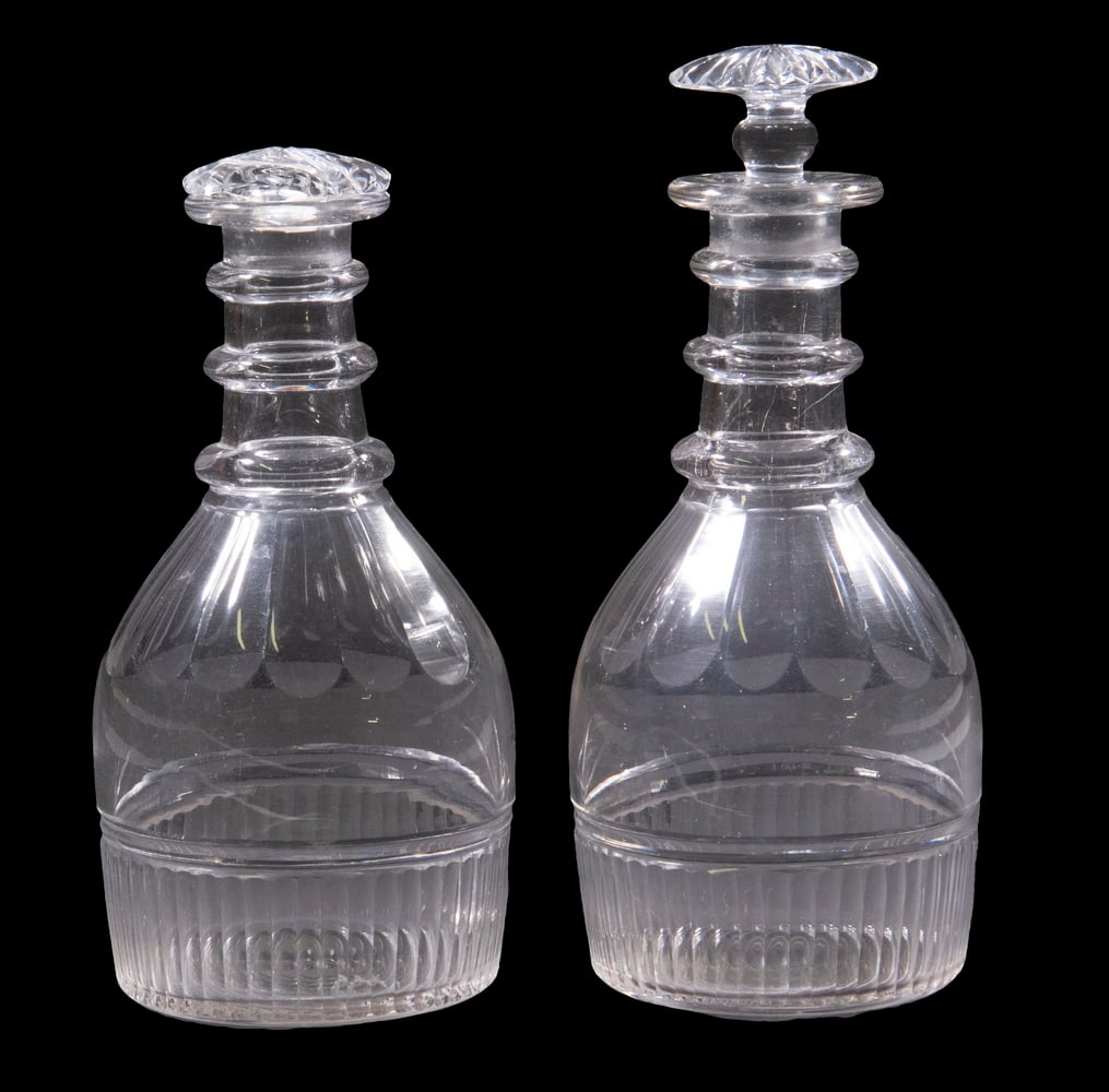 PR GEORGIAN CUT CRYSTAL DECANTERS: Pair of Anglo-Irish Three-Ring Clear Decanters, with mushroom form stoppers, having fluted tops and ribbed base edge, polished pontil bases, 8 1/2" high, 3 1/2" diam. Both with base edge scratches, lo