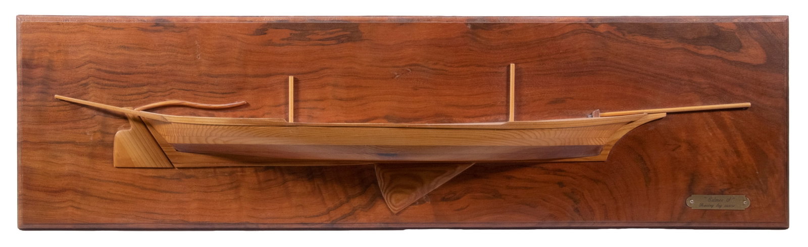 HALF HULL MODEL OF CHESAPEAKE LOG CANOE "EDMEE S": Handcrafted in Exotic Woods, planked model of log canoe "Edmee S" (built in the 1930s and one of the last Chesapeake Bay racing canoes that is still raced today), with engraved brass plaque, mounted o