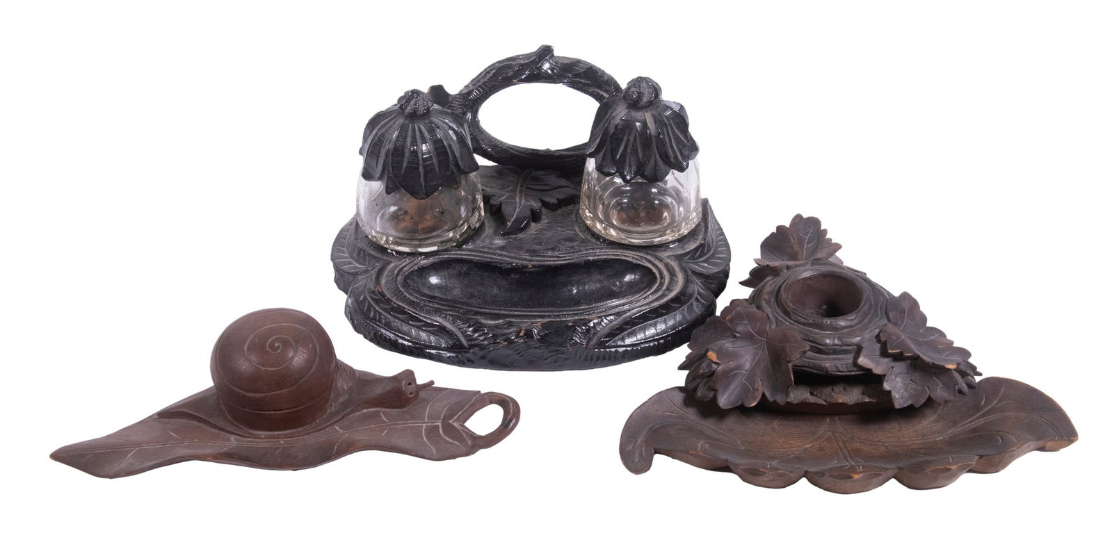 CARVED WOODEN INKWELLS: (3) Piece Late 19th - Early 20th c. Lot, incl: Black Forest carved inkstand, branch and leaves design, having two glass ink bottles with carved lids, with back handle, 3 3/4" high, 7" x 6 1/2"; Snail 