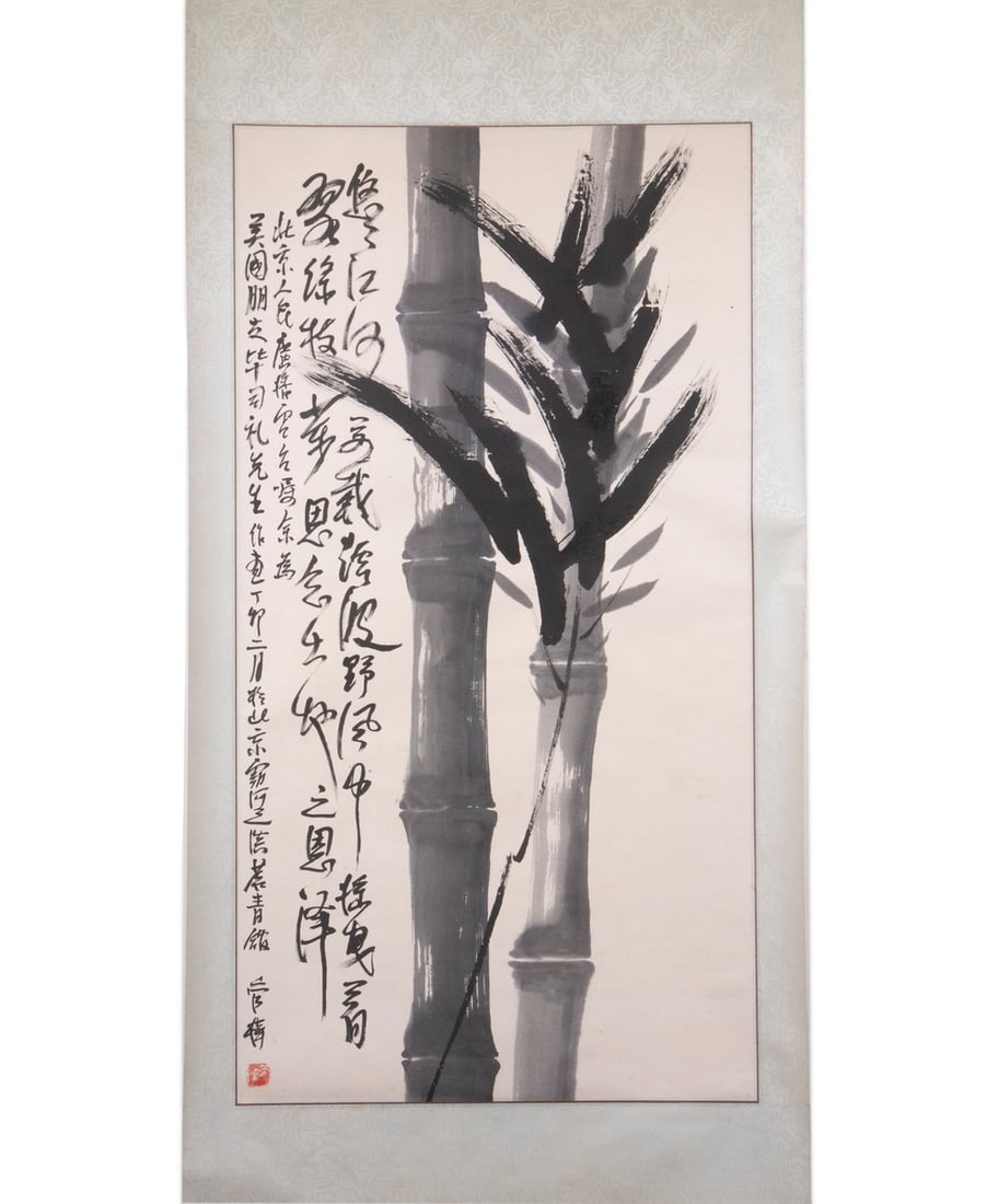 CHINESE BRUSH & INK SCROLL: Black and White bamboo, with lengthy inscription, cream brocade mount, 41" x 23 1/2" sheet on 69" x 26 1/2" mount.