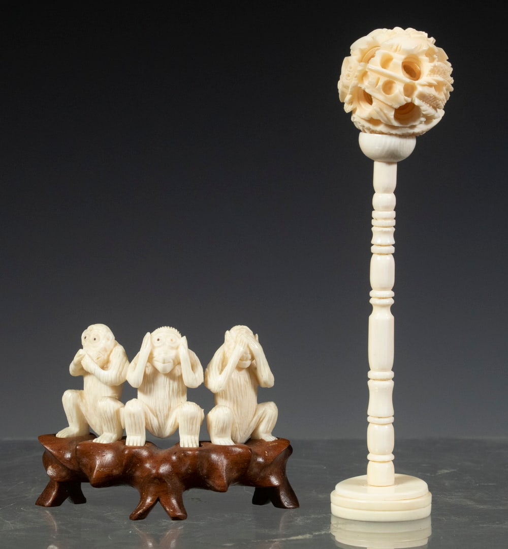 (2) JAPANESE CARVINGS: Including: The Nara Monkey Threesome (See no evil....), with single rosewood stand, 1" figures; PLUS Puzzle Ball with ring and stand, 1" ball, 3 1/2" stand.