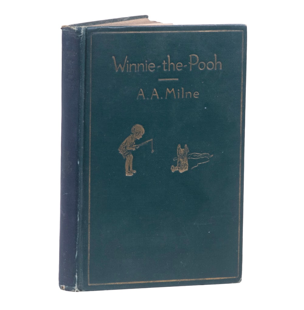 WINNIE-THE-POOH, FIRST EDITION: Winnie-the-Pooh by A.A. Milne with decorations by Ernest H. Shepherd. E.P. Dutton & co. 1926. Green cloth binding with gilt titles and decoration. Map endpapersa. 158 pps. 5" x 8". Very good condition