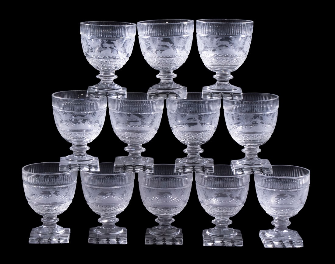 CUT & ETCHED EUROPEAN CRYSTAL STEMWARE: Set of (12) Vintage Clear Rummers or Goblets, possibly Anglo-Irish, with vertical cuts near rim, central panel with etched deer and scrollwork design, lower diamond cut band, squat stem and set on a s