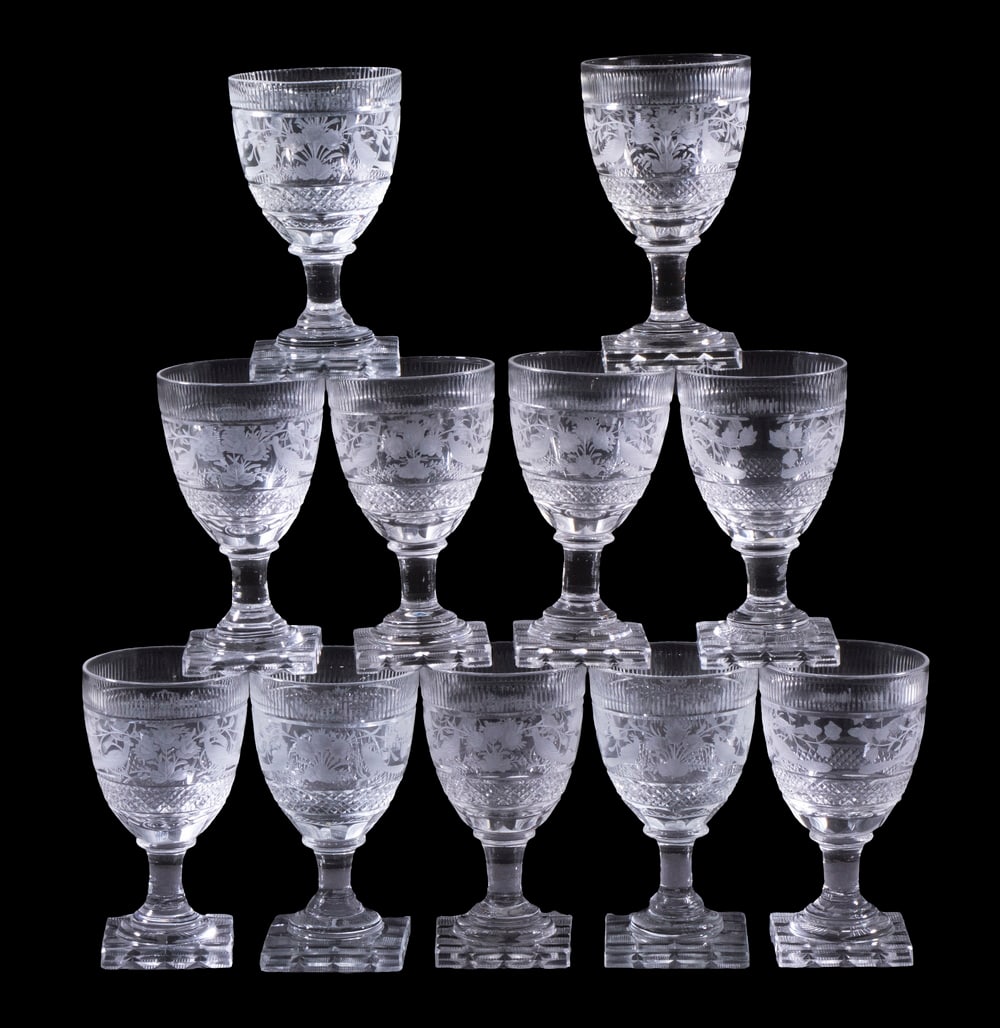 CUT & ETCHED EUROPEAN CRYSTAL STEMWARE: Set of (11) Vintage Clear Crystal Wine Glasses, possibly Anglo-Irish, each with vertical cuts below rim, central panel with etched bird and floral decoration, diamond cut lower band, set on a square b